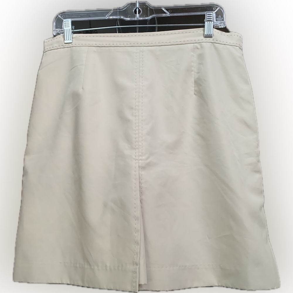 IZOD golf skort size 14, tan with white trim